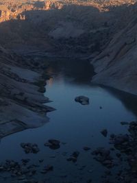 Scenic view of lake at sunset