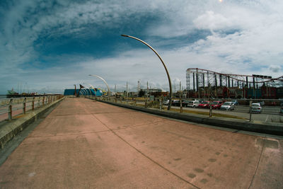 Street in city against sky