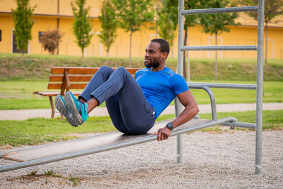 Full length of man exercising outdoors