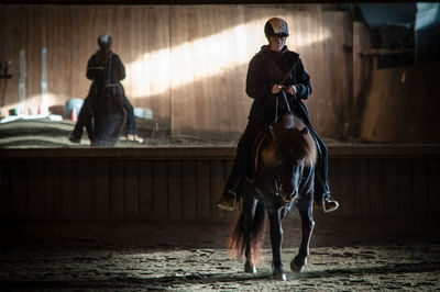 Man riding horse