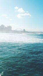 Scenic view of sea against blue sky