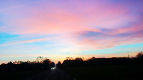 Road against sky during sunset