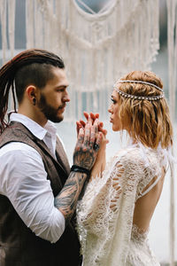 Young couple standing outdoors