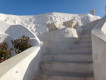 Low angle view of staircase against sky