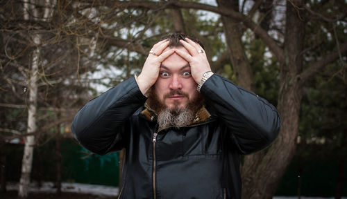 Man standing outdoors during winter