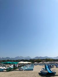 Scenic view of sea against clear blue sky