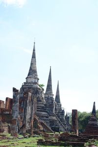 Old temple building against sky