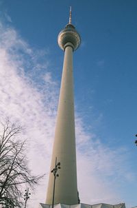 Low angle view of communications tower against sky - alexanderplatz 