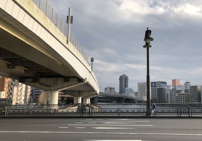 View of elevated road against cloudy sky
