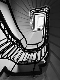 Low angle view of spiral staircase in building