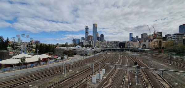 High angle view of railroad tracks amidst buildings in city