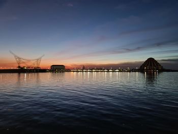 Scenic view of sea against sky at sunset