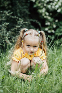 Summer activities and connecting with nature for kids. cute little girl with two ponytails runs