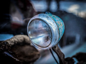 Close-up of damaged headlight