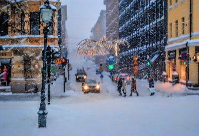 People on city street during winter