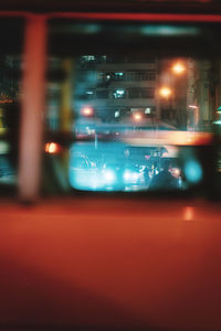 Close-up of illuminated glass window at night