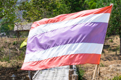 Close-up of flag against built structure