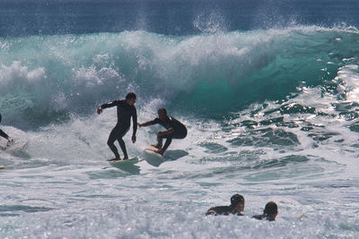 People enjoying in sea