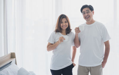 Portrait of a smiling young couple