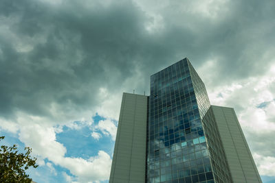 Low angle view of modern buildings against sky