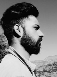 Portrait of young man looking away