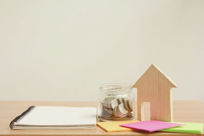 Close-up of books on table against white background