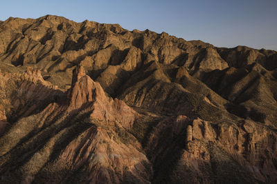 Aerial view of rocky landscape against sky