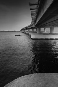 Bridge over river against sky