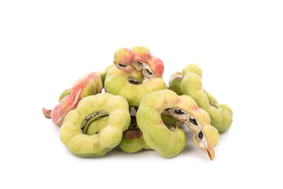 Close-up of fruits against white background