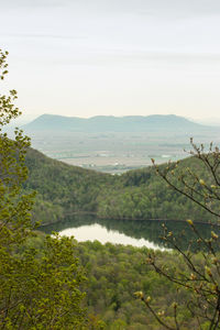 Scenic view of agricultural landscape against sky