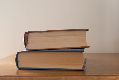 Stack of books on table