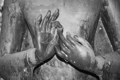 Close-up of hands sculpture