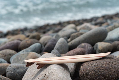 Close-up of stones on beach