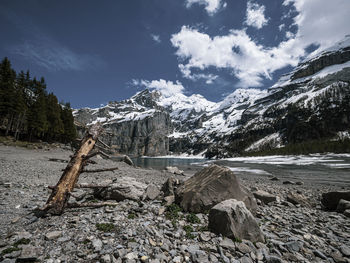 Scenic view of snowcapped mountains against sky