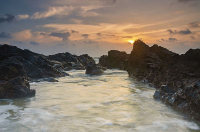 Scenic view of sea against sky during sunset