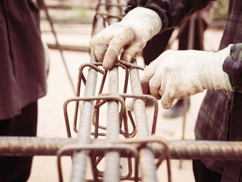 Cropped image of construction workers