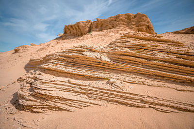 Scenic view of rock formations on desert against sky