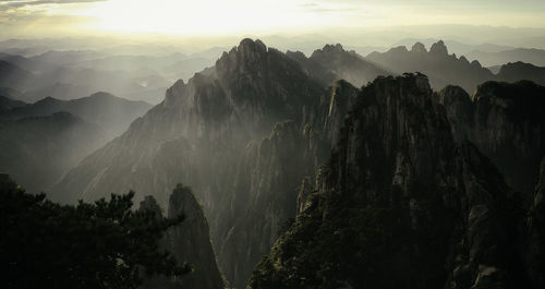 Panoramic view of mountains against sky during sunset