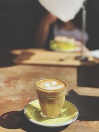 Close-up of coffee served on table