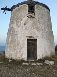 Low angle view of old building against sky