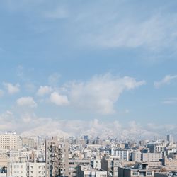 High angle view of buildings against sky