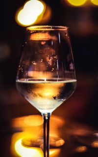 Close-up of wine glass on table