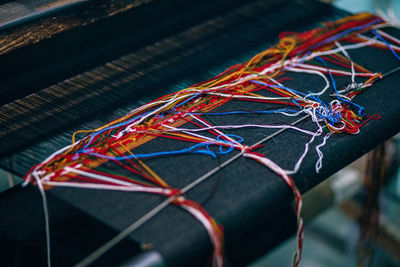 High angle view of multi colored paper on table