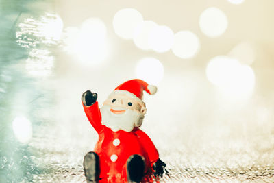 Close-up of stuffed toy on snow during christmas