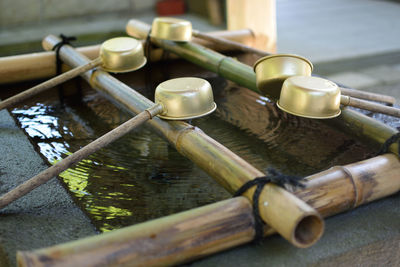 Bamboo dippers over water