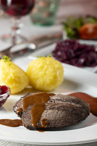 Close-up of fruits in plate on table