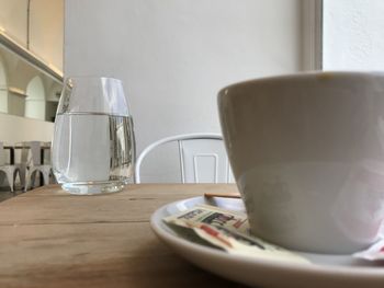 Close-up of coffee cup on table