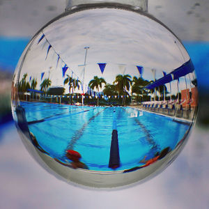 Close-up of swimming pool against blue sky