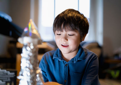 Portrait of cute boy at home