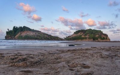 Scenic view of beach against sky